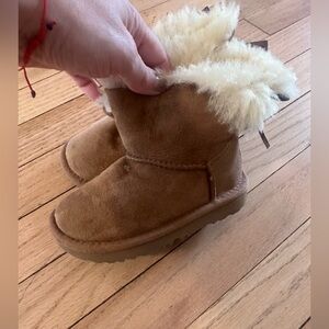 Tan uggs w/ satin bow -Toddler size 8
